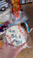 Cookie with 'Go Blue Jays' text and baseball design, wrapped in clear plastic.