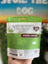 Hand holding a package of Bison Crisps with a blurred outdoor background
