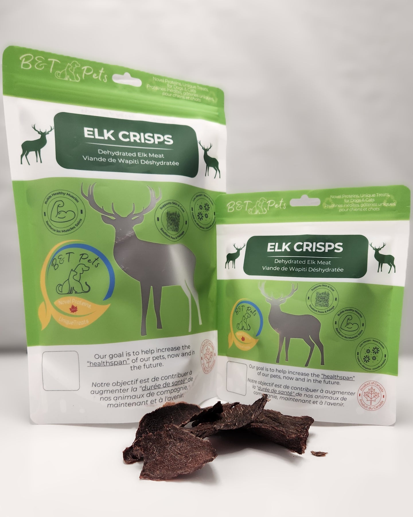 Two packages of Elk Crisps with a small pile of crisps in front on a white background