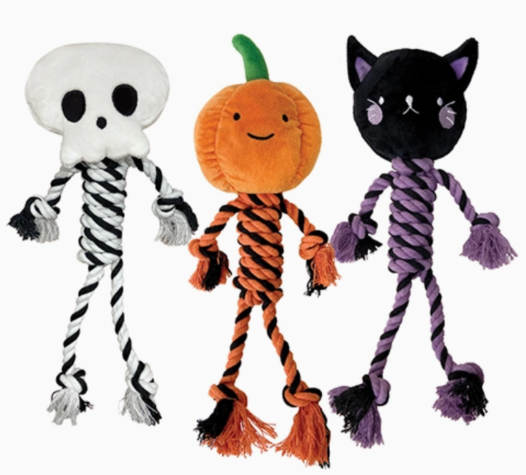 Three Halloween-themed dog toys: a skeleton, pumpkin, and black cat on a white background.