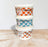 Three containers of Lickable Frozen Yogurt for Dogs stacked together, each labeled with a different flavor: Pumpkin Pie, Cookie Monster, and Moose Tracks.
